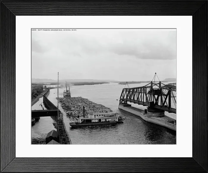 Framed Print : Raft passing drawbridge, Winona, Minn. between 1880 and 1899. Creator: Unknown Framed Print : Raft passing drawbridge, Winona, Minn. between 1880 and 1899. Creator: Unknown