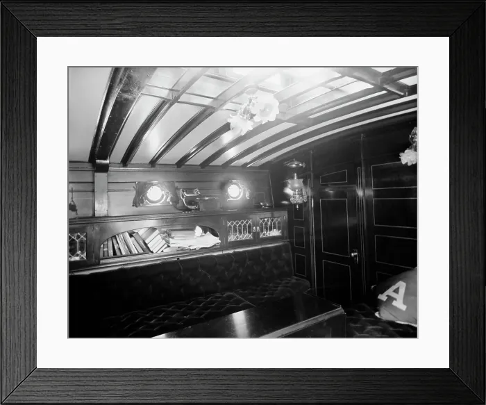 Framed Print : Yacht Althea, cabin, showing books, between 1907 and 1915. Creator: Unknown Framed Print : Yacht Althea, cabin, showing books, between 1907 and 1915. Creator: Unknown