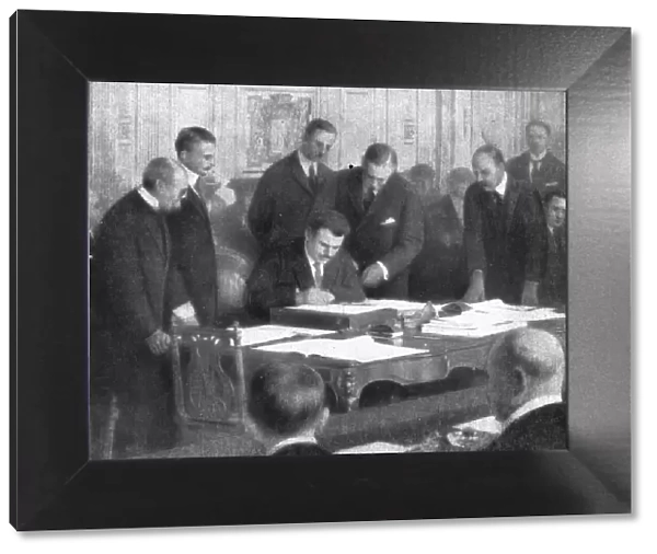Le retour a la paix; M Stamboulinsky, plenipotentiaire du royaume de Bulgarie, signant... 1919. Creator: Henri Manuel
