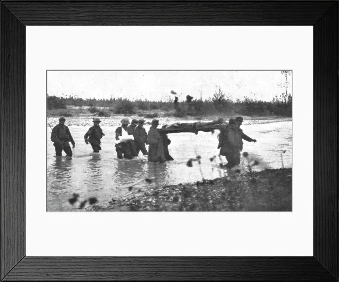 Framed Print : L'autriche succombe; Un gue de la Piave; blesse transporte par des prisonniers autrichiens, 1918. Creator: Unknown Framed Print : L'autriche succombe; Un gue de la Piave; blesse transporte par des prisonniers autrichiens, 1918. Creator: Unknown
