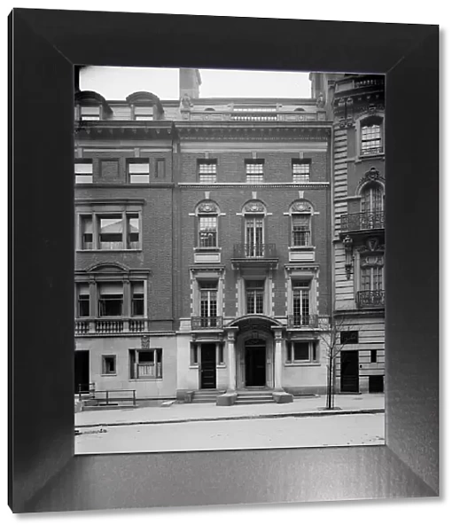 Four-story townhouse with curved pediment, possibly New York, N.Y. between 1900 and 1910. Creator: William H. Jackson