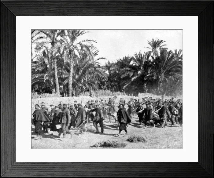 Framed Print : Tandis que.; Voici des prisonniers allemands traversant une riante oasis algerienne pour... 1917 Creator: Unknown Framed Print : Tandis que.; Voici des prisonniers allemands traversant une riante oasis algerienne pour... 1917 Creator: Unknown