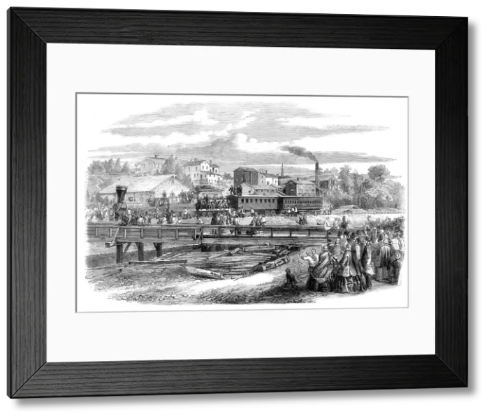 Framed Print : Arrival of the first train of the Atlantic and Great Western Railroad at James Town... 1860. Creator: Unknown Framed Print : Arrival of the first train of the Atlantic and Great Western Railroad at James Town... 1860. Creator: Unknown