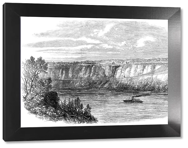 Farina, with a man on his back, crossing the Niagara on a tightrope... August 29, 1860. Creator: Unknown