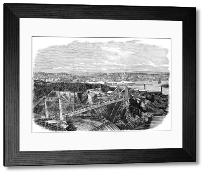 Framed Print : The Suspension Bridge over the River St. John, New Brunswick, visited by the Prince of Wales... 186 Creator: Unknown Framed Print : The Suspension Bridge over the River St. John, New Brunswick, visited by the Prince of Wales... 186 Creator: Unknown