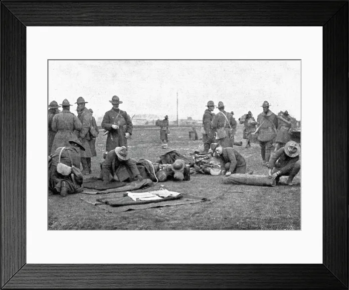 Framed Print : Les Americains en Ligne; Le paquetage est roule a la descente du train, 1917. Creator: Unknown Framed Print : Les Americains en Ligne; Le paquetage est roule a la descente du train, 1917. Creator: Unknown