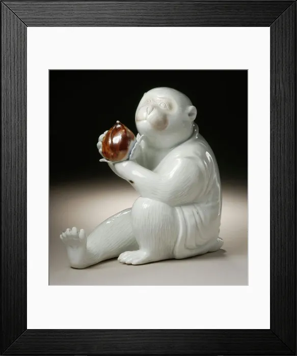 Framed Print : Costumed Monkey Holding a Chestnut, 19th century. Creator: Unknown