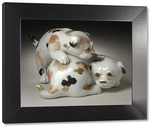 Okimono in the Form of a Pair of Gamboling Piebald Puppies, 19th century. Creator: Unknown
