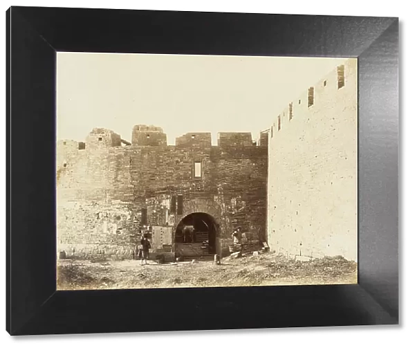 Courtyard with Fortified Walls and Figures, 1860. Creator: Felice Beato