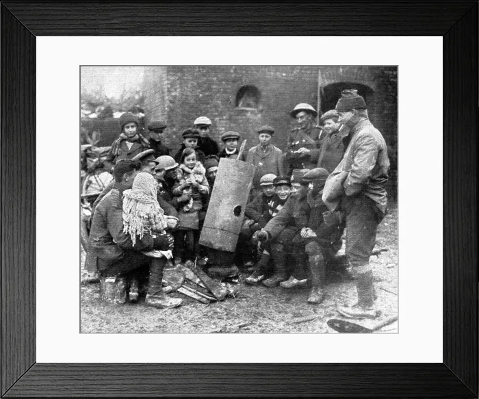 Framed Print : Delivres ! ; La population enfantine d'un village libere se presse autour d'un brasero improvise pa Creator: Unknown Framed Print : Delivres ! ; La population enfantine d'un village libere se presse autour d'un brasero improvise pa Creator: Unknown