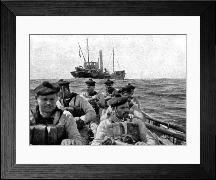 Framed Print : At Sea: The coastguard: boarding crew going aboard a suspect trawler... 1917. Creator: Unknown Framed Print : At Sea: The coastguard: boarding crew going aboard a suspect trawler... 1917. Creator: Unknown