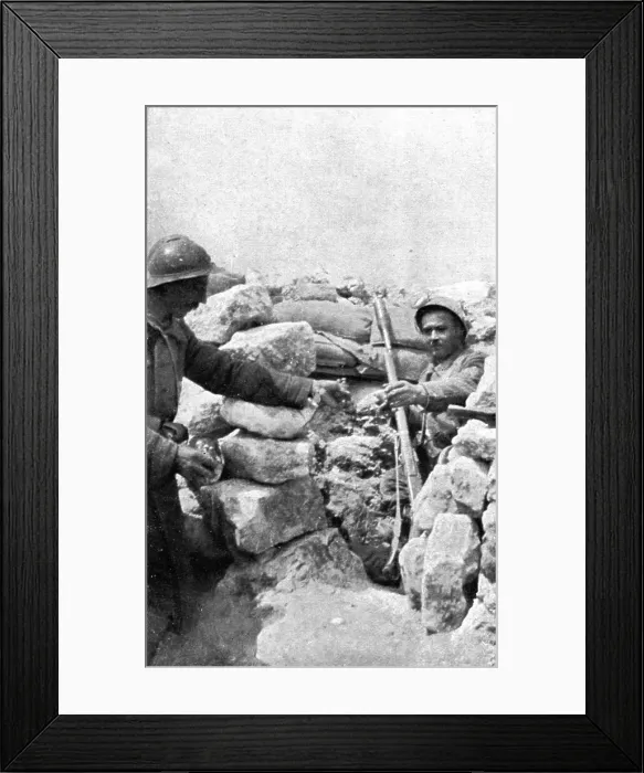 Framed Print : Life in the trenches in Champagne; A lookout teased by the enemy is passed hand grenades, 1917. Creator: Unknown Framed Print : Life in the trenches in Champagne; A lookout teased by the enemy is passed hand grenades, 1917. Creator: Unknown