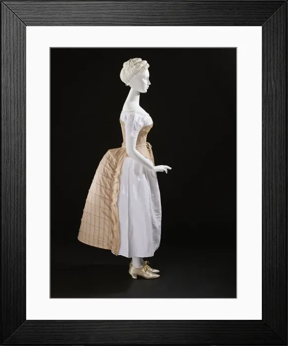 Framed Print : Woman's bustle, England, c.1885. Corset: c.1865-75, Chemise: c.1850-70, Shoes: 1875-1900. Creator: Unknown Framed Print : Woman's bustle, England, c.1885. Corset: c.1865-75, Chemise: c.1850-70, Shoes: 1875-1900. Creator: Unknown