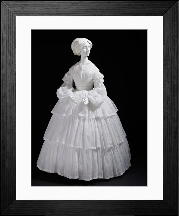 Framed Print : Woman's white muslin dress with tiered flounces, Europe, c.1855. Creator: Unknown Framed Print : Woman's white muslin dress with tiered flounces, Europe, c.1855. Creator: Unknown