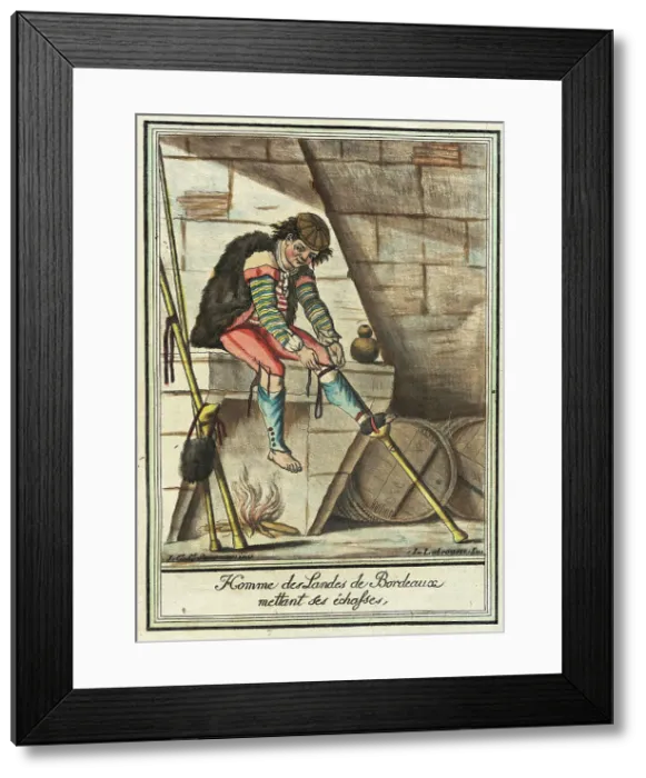 Framed Print : Costumes de Différent Pays, Homme des Landes de Bordeaux Mettant ses Échasses, c1797. Creators: Jacques Grasset de Saint-Sauveur, LF Labrousse Framed Print : Costumes de Différent Pays, Homme des Landes de Bordeaux Mettant ses Échasses, c1797. Creators: Jacques Grasset de Saint-Sauveur, LF Labrousse