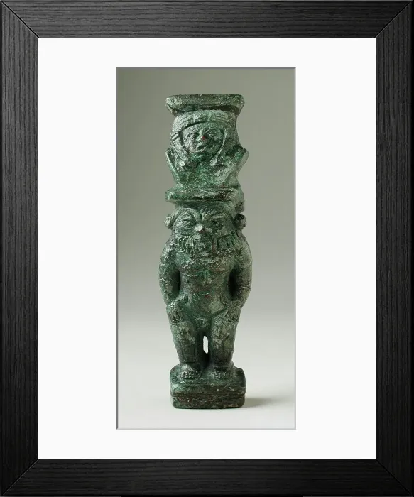 Framed Print : Standing Bes Figurine with Hathor Headdress, Probably Late Period-Ptolemaic Period (380-30 BCE). Creator: Unknown Framed Print : Standing Bes Figurine with Hathor Headdress, Probably Late Period-Ptolemaic Period (380-30 BCE). Creator: Unknown