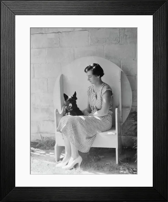 Framed Print : Mrs. Walter Fletcher with dog, seated outdoors, between 1933 and 1942. Creator: Arnold Genthe Framed Print : Mrs. Walter Fletcher with dog, seated outdoors, between 1933 and 1942. Creator: Arnold Genthe