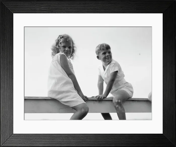 Framed Print : Kane children, seated on a fence, between 1911 and 1942. Creator: Arnold Genthe Framed Print : Kane children, seated on a fence, between 1911 and 1942. Creator: Arnold Genthe