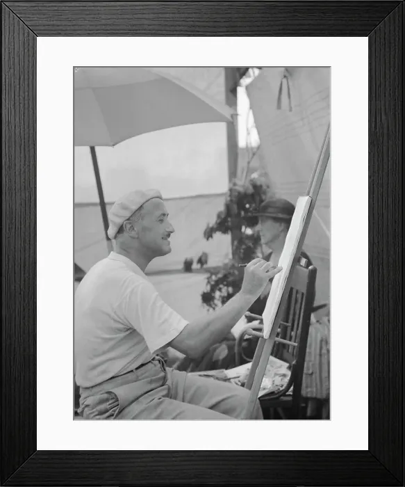 Framed Print : Man seated outdoors painting, East Hampton, Long Island, between 1933 and 1942. Creator: Arnold Genthe Framed Print : Man seated outdoors painting, East Hampton, Long Island, between 1933 and 1942. Creator: Arnold Genthe