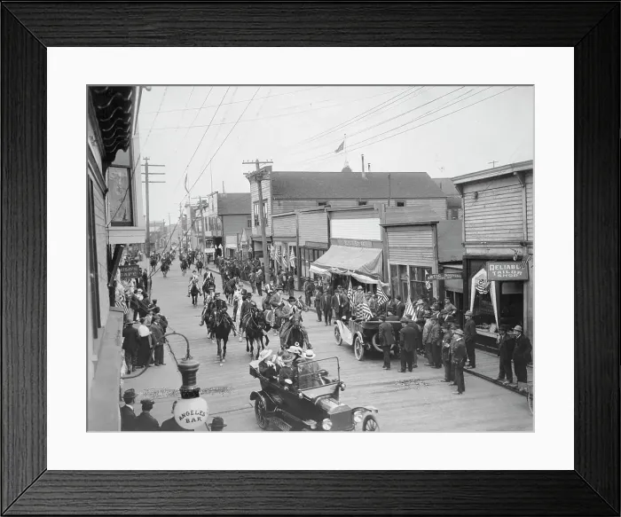 Framed Print : July 4th parade on Front Street, 1916. Creator: Unknown Framed Print : July 4th parade on Front Street, 1916. Creator: Unknown