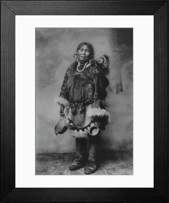 Framed Print : Eskimo mother carrying a child on her back, 1916(?). Creator: Unknown Framed Print : Eskimo mother carrying a child on her back, 1916(?). Creator: Unknown