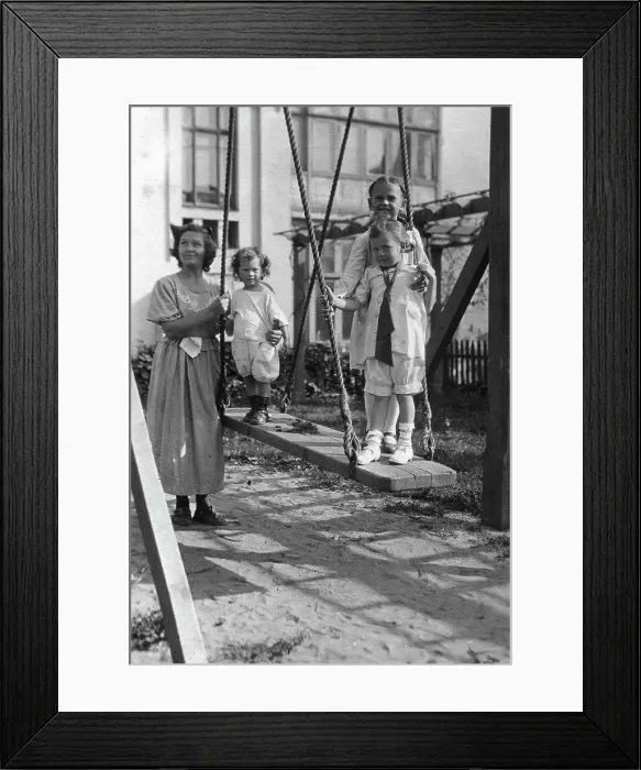 Framed Print : Irina, Yuliy and Vera Briner with nanny Katya in the courtyard of a house on Svetlanskaya St, 1923. Creator: Unknown Framed Print : Irina, Yuliy and Vera Briner with nanny Katya in the courtyard of a house on Svetlanskaya St, 1923. Creator: Unknown