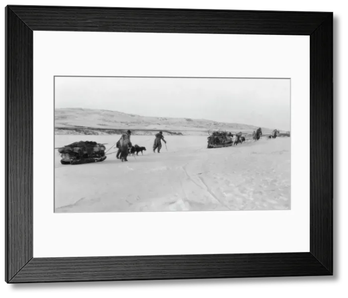 Framed Print : Eskimos on their way to the sea, between c1900 and 1929. Creator: Unknown Framed Print : Eskimos on their way to the sea, between c1900 and 1929. Creator: Unknown