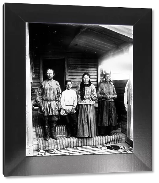 A peasant family from the village of Lovatskaya, Kansky district, 1905. Creator: Unknown