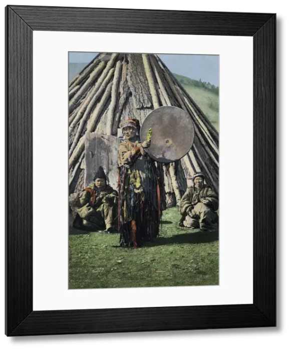 Framed Print : Altai Shaman with Tambourine in Front of a Traditional Dwelling (Chaadyr), 1911-1913. Creator: Sergei Ivanovich Borisov Framed Print : Altai Shaman with Tambourine in Front of a Traditional Dwelling (Chaadyr), 1911-1913. Creator: Sergei Ivanovich Borisov