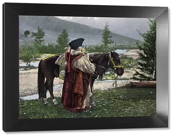 Altai Woman in National Costume (Hat: Kuaraan Boruk, Sheepskin Coat: Ton, Sleeveless... 1911-1913. Creator: Sergei Ivanovich Borisov)