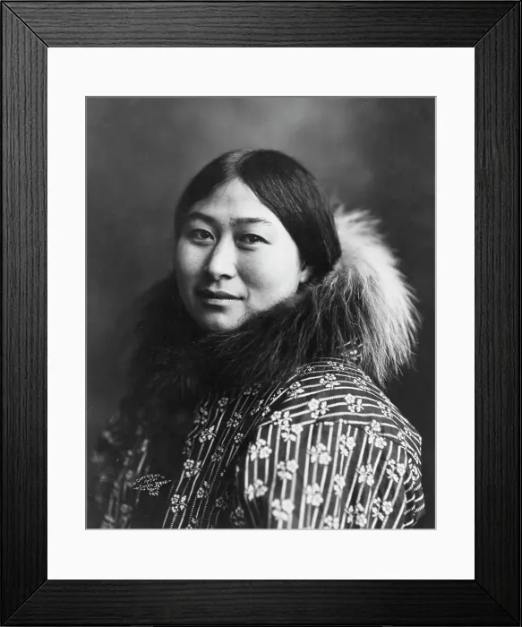 Framed Print : Eskimo woman, c1907, printed (1916?). Creator: Lomen Brothers