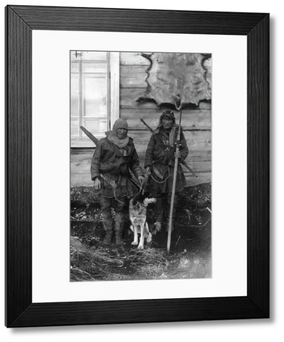 Framed Print : Two Chukchi in national clothes, with guns and a spear, 1910-1929. Creator: Ivan Emelianovich Larin Framed Print : Two Chukchi in national clothes, with guns and a spear, 1910-1929. Creator: Ivan Emelianovich Larin