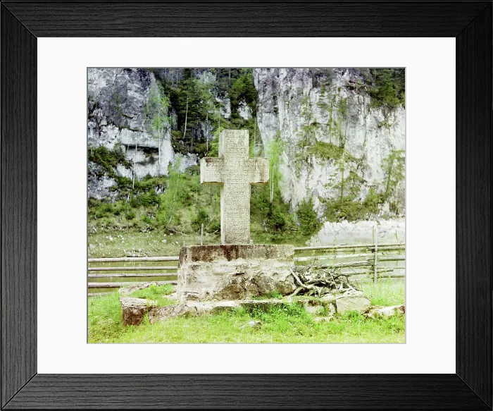 Framed Print : Stone cross on the bank opposite Pisanyi Rock in memory of Demidov, Chusovaia River, 1912. Creator: Sergey Mikhaylovich Prokudin-Gorsky