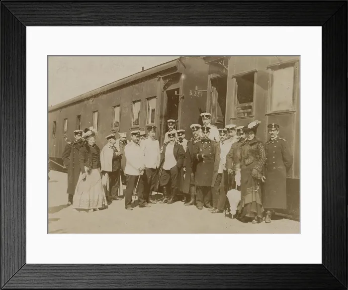Framed Print : Railway employees against the background of train cars, 1910-1919. Creator: Unknown Framed Print : Railway employees against the background of train cars, 1910-1919. Creator: Unknown