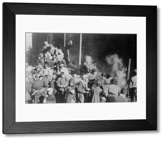 Framed Print : Poor in North France fed from German field kitchen, between c1914 and c1915. Creator: Bain News Service Framed Print : Poor in North France fed from German field kitchen, between c1914 and c1915. Creator: Bain News Service