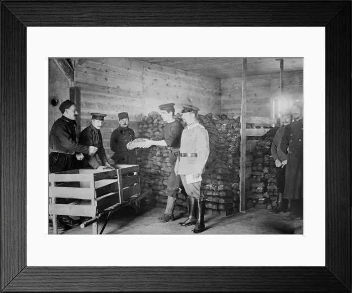 Framed Print : Giving Bread to British prisoners, between 1914 and c1915. Creator: Bain News Service Framed Print : Giving Bread to British prisoners, between 1914 and c1915. Creator: Bain News Service