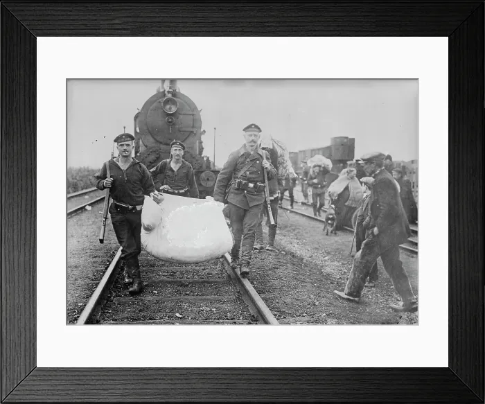 Framed Print : Germans helping refugees returning to Antwerp, 1914. Creator: Bain News Service Framed Print : Germans helping refugees returning to Antwerp, 1914. Creator: Bain News Service