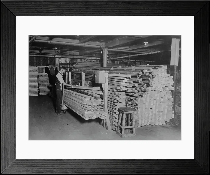 Framed Print : Examining spruce for planes, between c1915 and c1920. Creator: Bain News Service Framed Print : Examining spruce for planes, between c1915 and c1920. Creator: Bain News Service