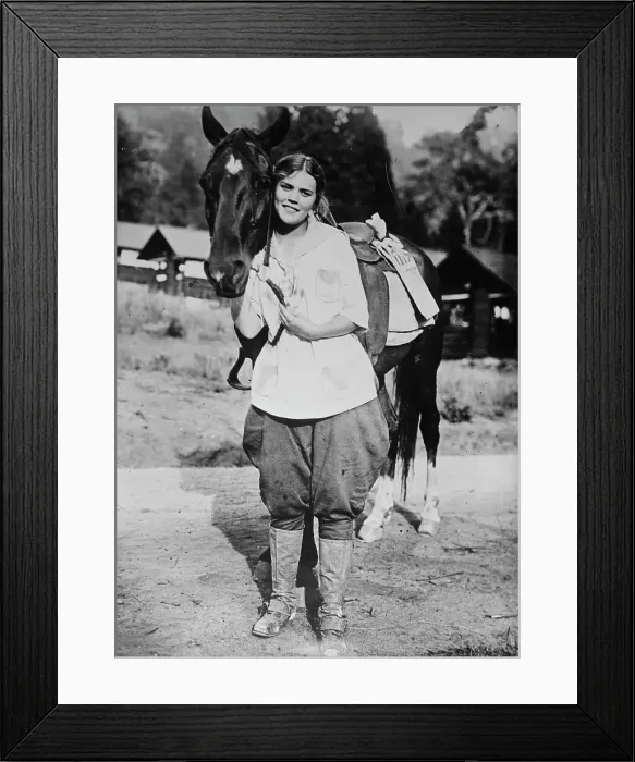 Framed Print : Los Angeles [woman] mail carrier, between c1915 and c1920. Creator: Bain News Service