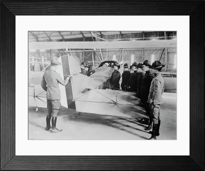 Framed Print : Studying aeroplane [i.e. airplane] rudder, 1917 or 1918. Creator: Bain News Service