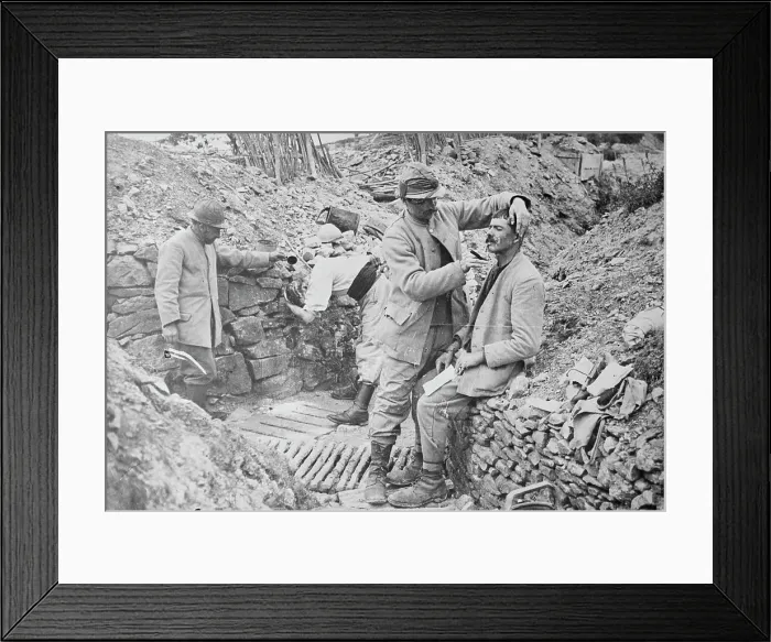 Framed Print : French trench barber, between c1915 and 1918. Creator: Bain News Service Framed Print : French trench barber, between c1915 and 1918. Creator: Bain News Service
