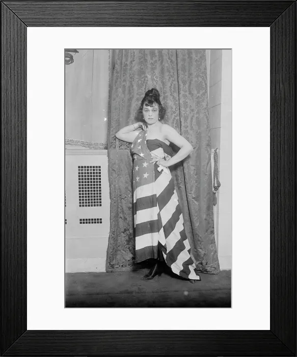 Framed Print : Alice Brady [draped in Old Glory], between c1915 and c1920. Creator: Bain News Service