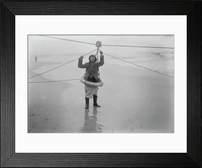 Framed Print : Man demonstrating ship rescue apparatus, 1919. Creator: Bain News Service Framed Print : Man demonstrating ship rescue apparatus, 1919. Creator: Bain News Service