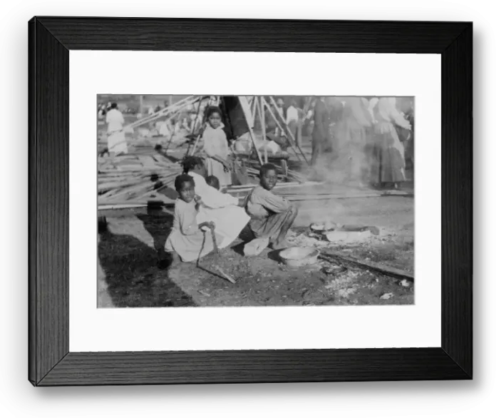 Framed Print : Louisiana Flood - refugees cook government rations, 1912. Creator: Bain News Service Framed Print : Louisiana Flood - refugees cook government rations, 1912. Creator: Bain News Service