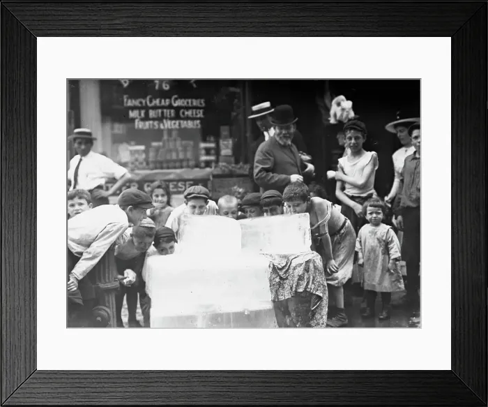 Framed Print : Licking blocks of ice on hot day, between c1910 and c1915. Creator: Bain News Service Framed Print : Licking blocks of ice on hot day, between c1910 and c1915. Creator: Bain News Service