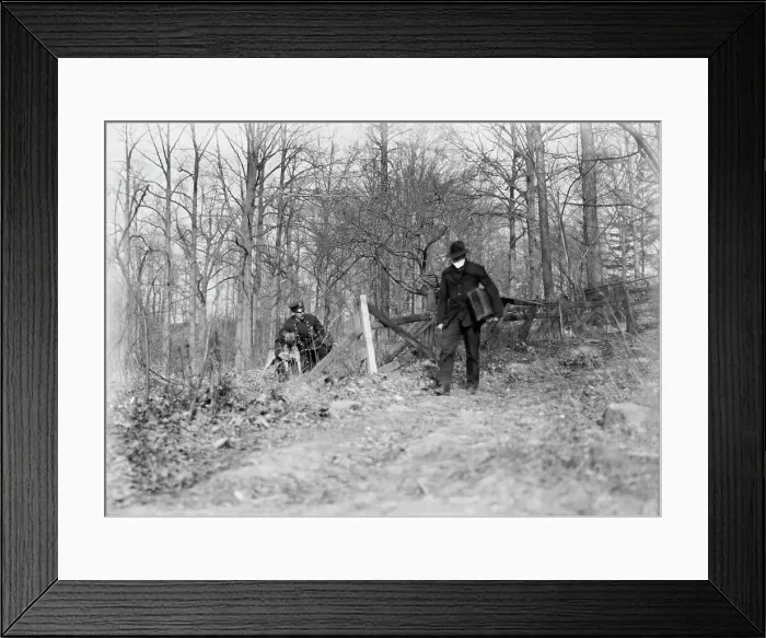 Framed Print : Policeman, police dog, waiting for thief, New York City, 1912. Creator: Bain News Service Framed Print : Policeman, police dog, waiting for thief, New York City, 1912. Creator: Bain News Service