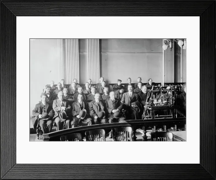 Framed Print : Candidates for naturalization seated in room, hats in laps, 1916. Creator: Bain News Service Framed Print : Candidates for naturalization seated in room, hats in laps, 1916. Creator: Bain News Service