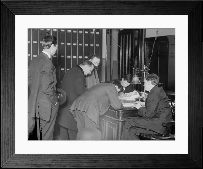 Framed Print : New citizens signing naturalization papers in judge's chambers, 1910. Creator: Bain News Service Framed Print : New citizens signing naturalization papers in judge's chambers, 1910. Creator: Bain News Service