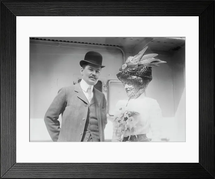 Framed Print : Mr. and Mrs. C.F. Bishop next to train, 1910. Creator: Bain News Service Framed Print : Mr. and Mrs. C.F. Bishop next to train, 1910. Creator: Bain News Service