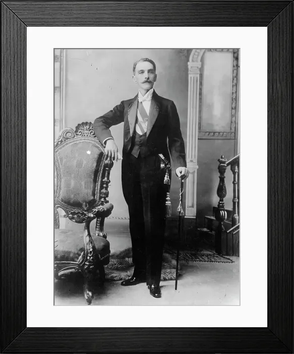 Framed Print : C.E. Restrepo posing next to chair, with cane, 1910. Creator: Bain News Service Framed Print : C.E. Restrepo posing next to chair, with cane, 1910. Creator: Bain News Service